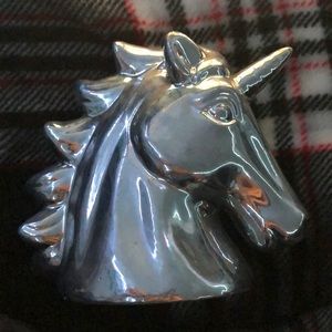 I’m selling a silver unicorn decoration